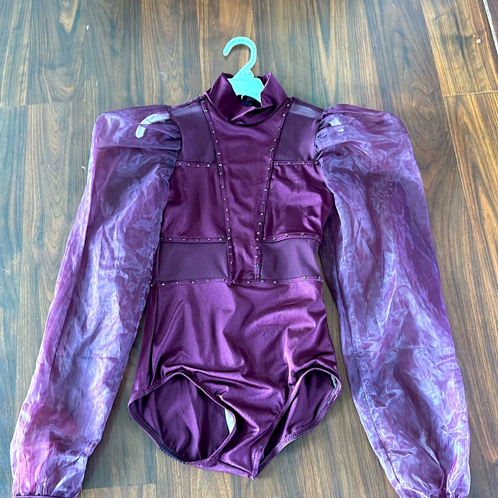 Maroon costume with added bling
